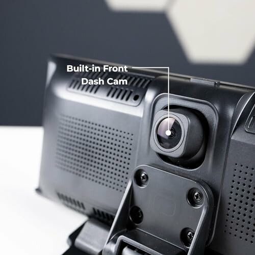 Close-up of a built-in front dash cam on a car device.